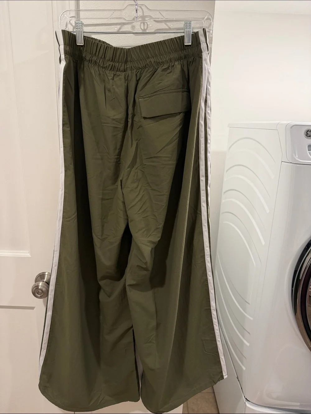 adidas Women’s wide leg Olive Track Pants with White Side Stripes
